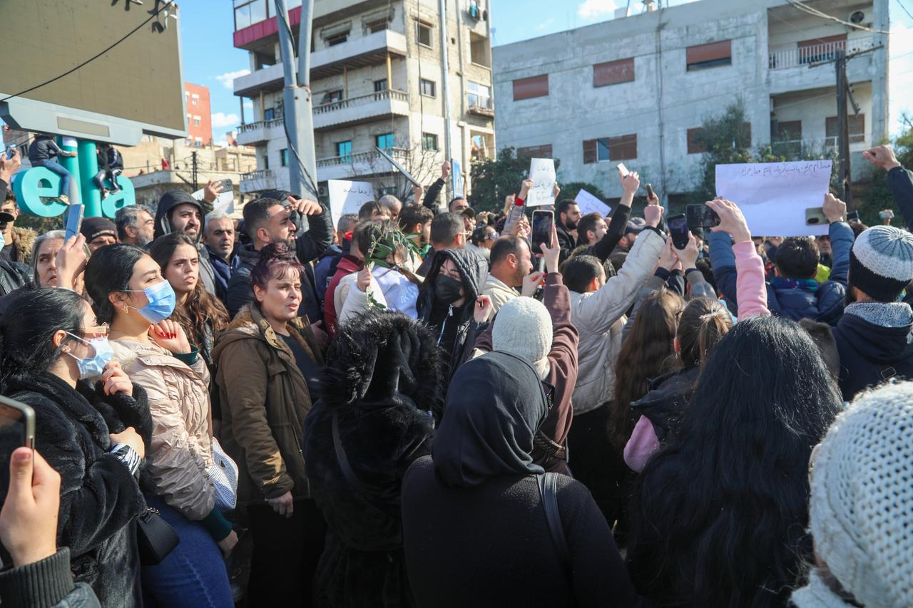 Demonstrators hold placards targeting the Damascus administration during a demonstration demanding federalism held in Latakia, Syria, Dec. 28, 2025. (AA Photo)