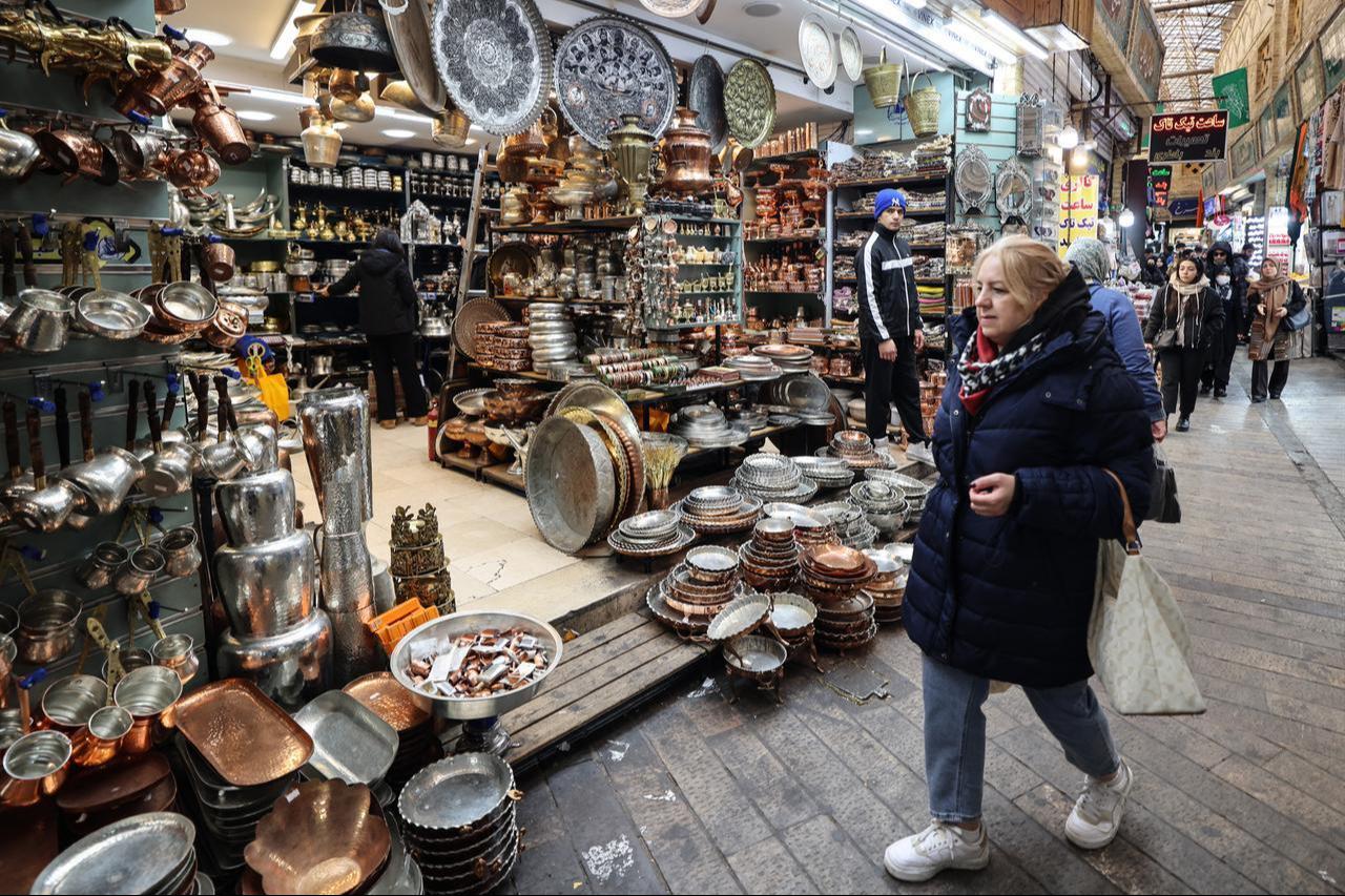 People shop at Tajrish Bazaar in the Iranian capital Tehran on December 29, 2025. (AFP Photo)