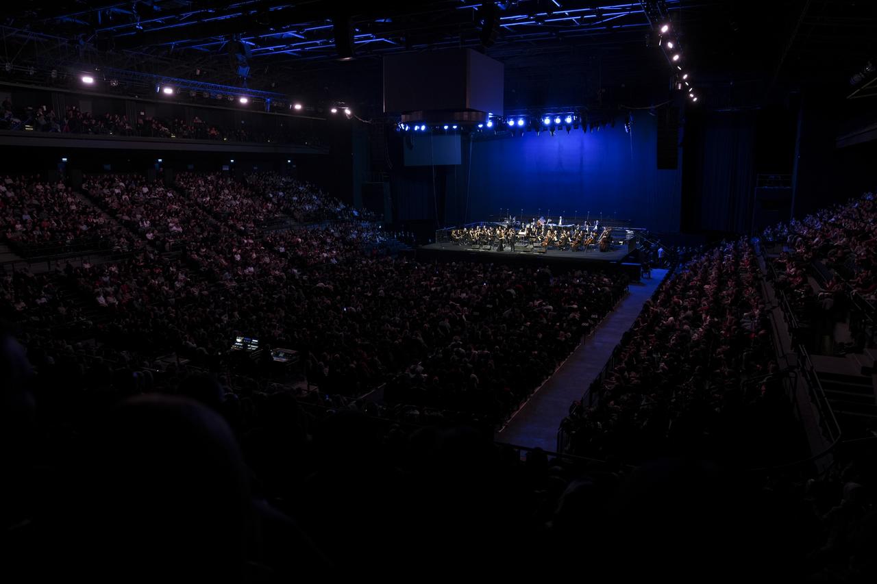 Fazil Say speaks on stage about uniting the timeless and universal voices of Mevlana and Mozart in his new work, noting that “Mevlana lived 800 years ago and Mozart 300 years ago, this timelessness needed to meet at a common point. Istanbul, Türkiye, December 27, 2025. (AA Photo)