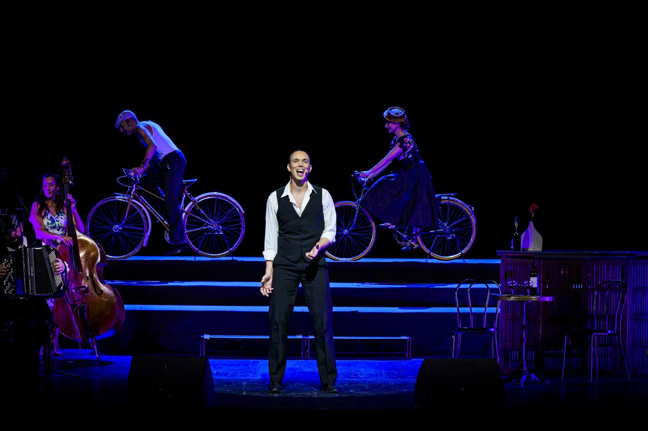 A scene from an earlier performance of “Paris! The Show,” where vocalists and dancers recreate Parisian street life on stage. (AA Photo)