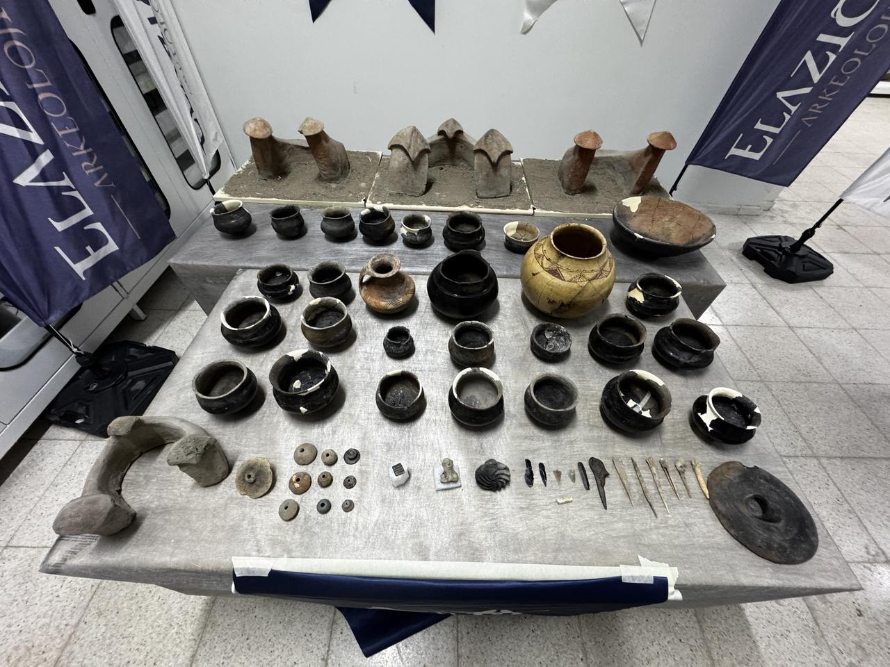 Stone seal and other archaeological artifacts discovered during excavations at Tadim Fortress and Hoyuk, now preserved and exhibited at the Elazig Archaeology and Ethnography Museum in eastern Türkiye, Dec. 30, 2025. (AA Photo)