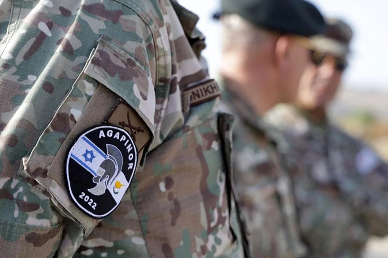 Greek Cypriot Christodoulides sings ‘return to Famagusta’ march at military event