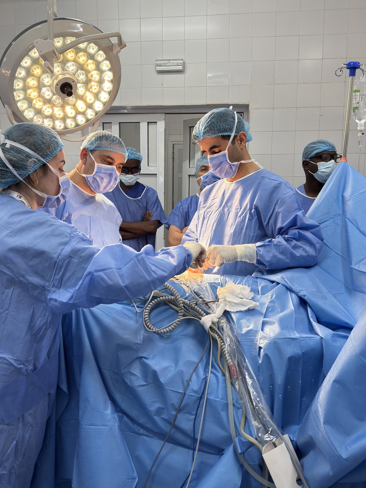 Turkish surgeons and Senegalese medical staff work together during a laparoscopic kidney transplant procedure at Ouakam Military Hospital in Dakar, Senegal, Dec. 30, 2025. (AA Photo)