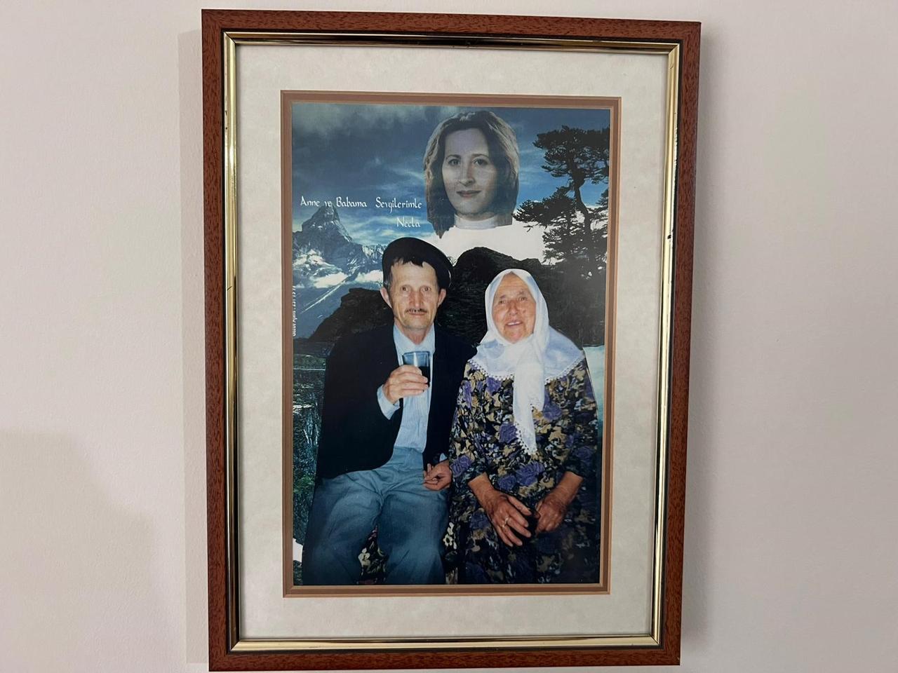 A framed family photograph displayed in Necla Ozmen’s home in Ankara, shown during her statement to the media. (IHA Photo)