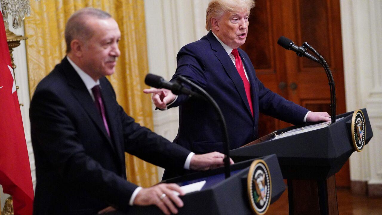US President Donald Trump and Turkey's President Recep Tayyip Erdogan (L) take part in a joint press conference in the East Room of the White House in Washington, DC on Nov. 13, 2019. (AFP Photo)