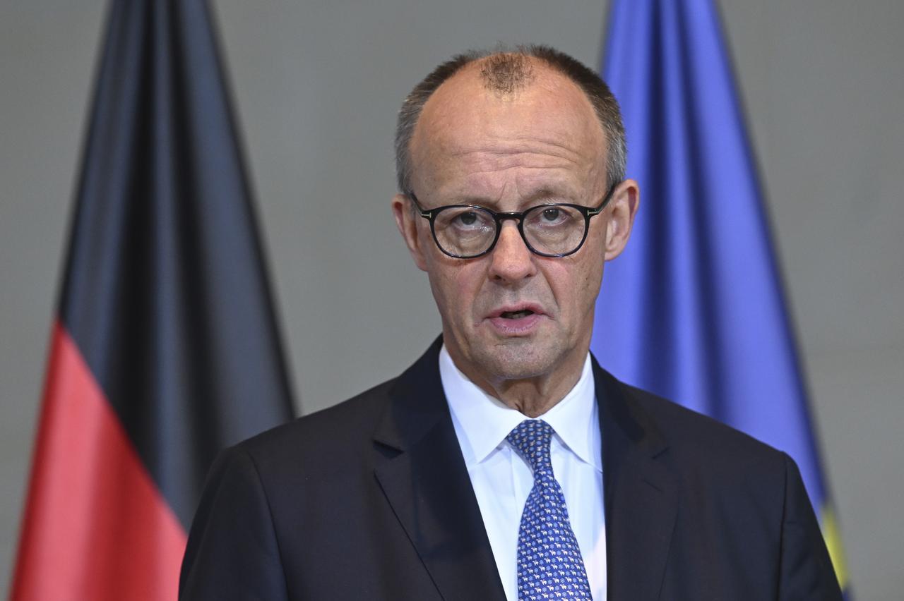 Polish Prime Minister Donald Tusk (not seen) and German Chancellor Friedrich Merz hold a joint press conference in Berlin, Germany on Dec. 1, 2025. (AA Photo)