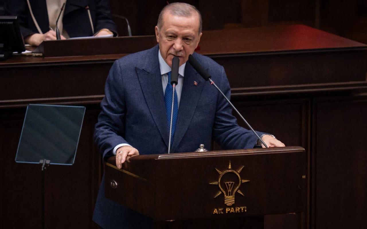 The image shows Recep Tayyip Erdogan, the President of Türkiye and Chairman of the AK Party, giving a speech at a parliamentary group meeting on December 3. (AA Photo)