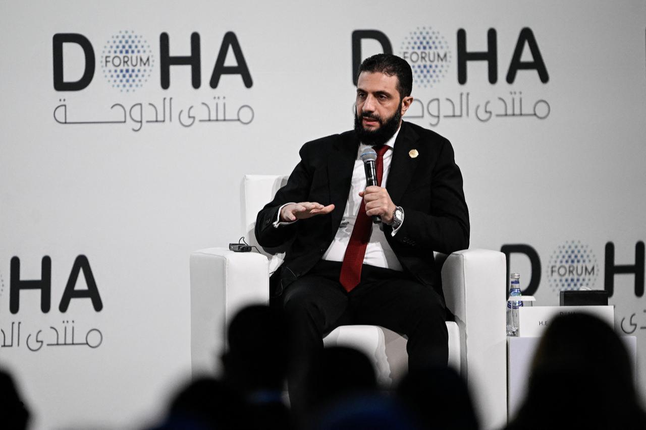 Syrian President Ahmed al-Sharaa speaks during the opening day of the Doha Forum, an annual diplomatic conference, in Doha on Dec. 6, 2025. (AFP Photo)