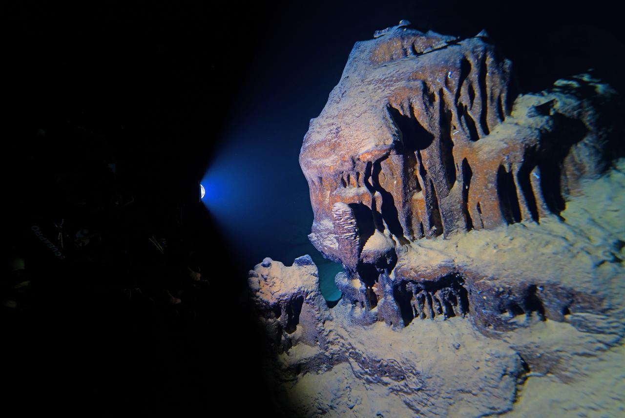 Divers capturing the sand pyramids, chimneys, stalactites and stalagmites in the underwater cave witnessed the vibrant world of marine life throughout the event. Hatay, Türkiye, December 8, 2025. (Tahsin Ceylan/ AA Photo)