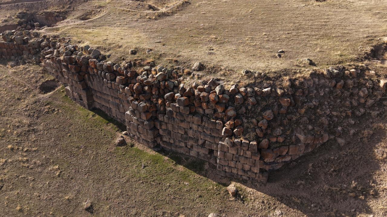 An aerial image captures the long stretch of fortification wall and the entrance unit revealed during excavations at Korzut Castle in Van’s Muradiye district, eastern Turkiye, Dec. 8, 2025. (AA Photo)