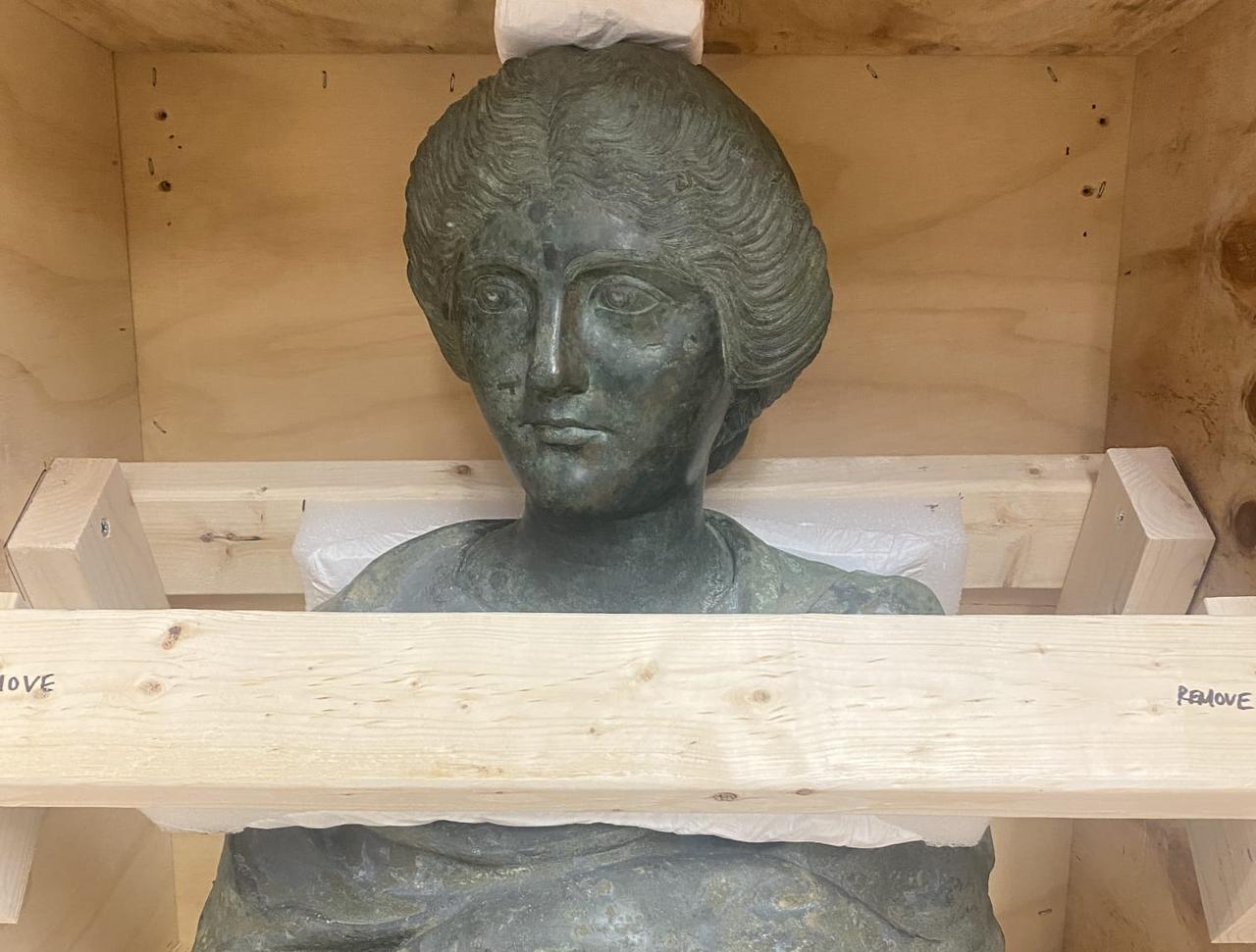 A bronze female bust from Boubon is secured in a wooden crate before shipment to Türkiye at the Manhattan District Attorney’s Office in New York, US, Dec. 5, 2025. (Photo via Ministry of Culture and Tourism)