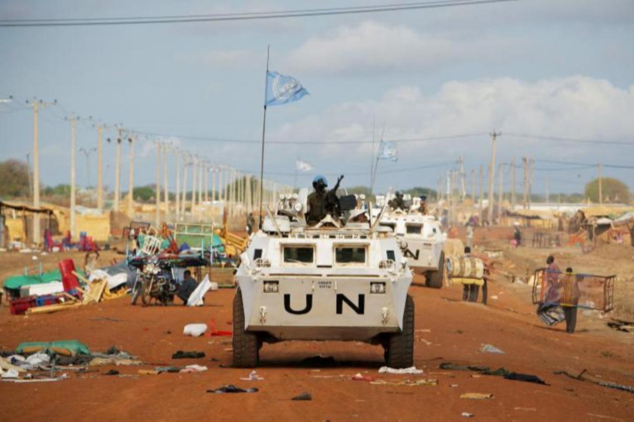 United Nations peacekeeping vehicles patrol a dusty road in Abyei, Sudan, accessed on Dec. 2, 2025. (Photo via un.org)