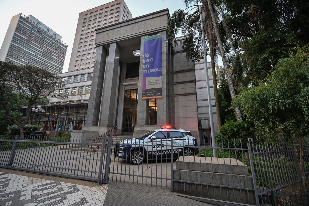 A Brazilian police patrol is seen standing guard outside the Mario de Andrade Public Library, where the theft occurred, in Sao Paulo, Brazil, December 8, 2025. (AFP Photo)