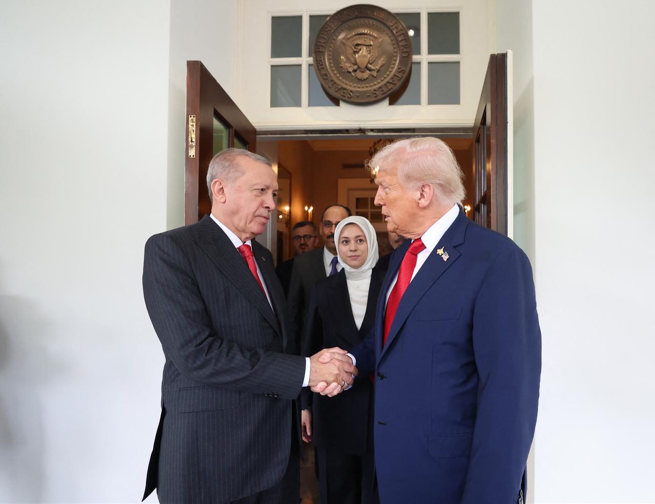 US President Donald Trump bids farewell to President Recep Tayyip Erdogan following a meeting in the Oval Office at the White House, Sept. 25, 2025, in Washington, DC. (Photo by Handout/ Turkish Presidential Press Service/AFP)