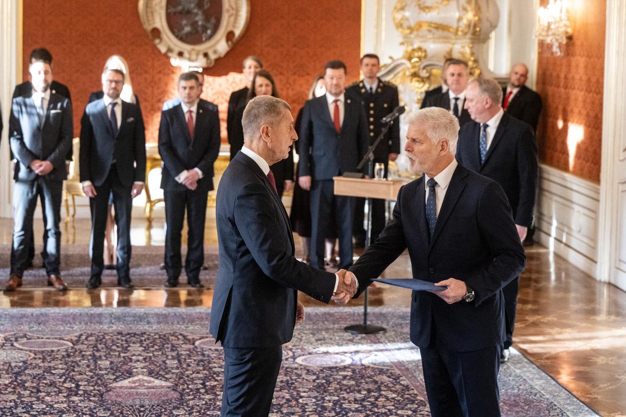 Czech President Petr Pavel (R) shakes hands with Andrej Babis (L), leader of the ANO ('YES') party, as he is appointed as the country’s new prime minister on December 9, 2025 at the Castle in Prague, Czech Republic. (AFP Photo)