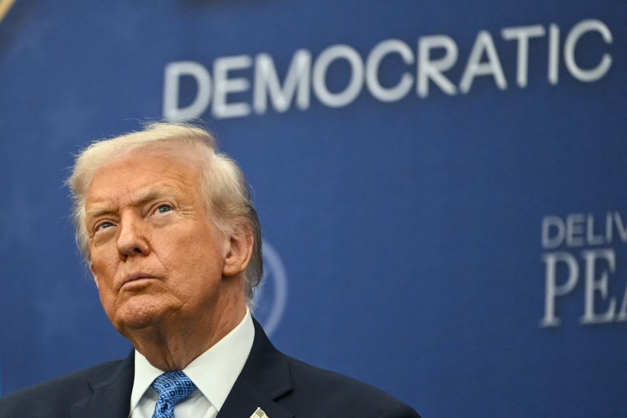 US President Donald Trump attends the signing ceremony of a peace deal with the President of Rwanda and the President of Congo in Washington, DC, Dec. 4, 2025. (AFP Photo)