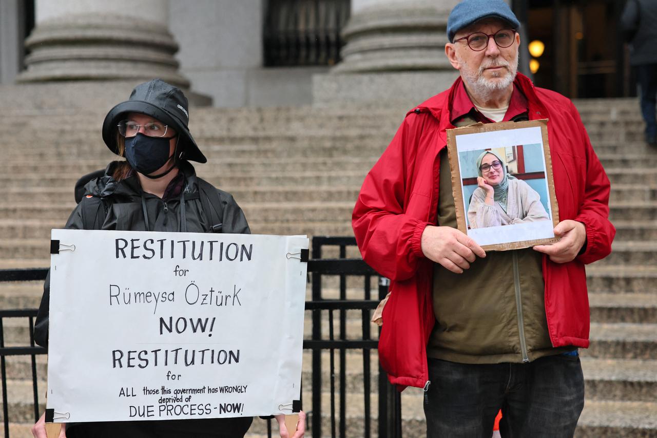 (FILES) People gather for a rally in support of Turkish student Rumeysa Ozturk (in photo) and Columbia University student activist Mohsen Mahdawi in Foley Square on May 6, 2025 in New York City. US Judge William Sessions on May 9, 2025, ordered the release of Turkish student Rumeysa Ozturk, a Ph.D student at Tufts University in Massachusetts, detained by federal agents as part of President Donald Trumps crackdown on pro-Palestinian campus activism. (Photo by Michael M. Santiago / GETTY IMAGES NORTH AMERICA / AFP)