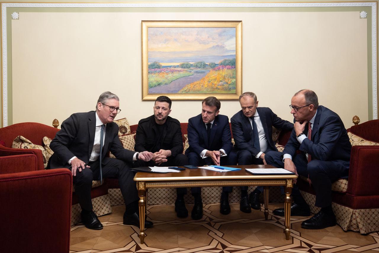 In this handout photograph taken and released by the Ukrainian Presidential Press Service on May 10, 2025, Ukraines President Volodymyr Zelensky (2nd R) attends a meeting with Britains Prime Minister Keir Starmer (L), Frances President Emmanuel Macron (2nd L), Polands Prime Minister Donald Tusk (R) and Germanys Chancellor Friedrich Merz (3rd R) in Kyiv, amid the Russian invasion of Ukraine. (Photo by Handout / UKRAINIAN PRESIDENTIAL PRESS SERVICE / AFP) / RESTRICTED TO EDITORIAL USE - MANDATORY CREDIT  AFP PHOTO / UKRAINIAN PRESIDENTIAL PRESS SERVICE  - NO MARKETING NO ADVERTISING CAMPAIGNS - DISTRIBUTED AS A SERVICE TO CLIENTS
