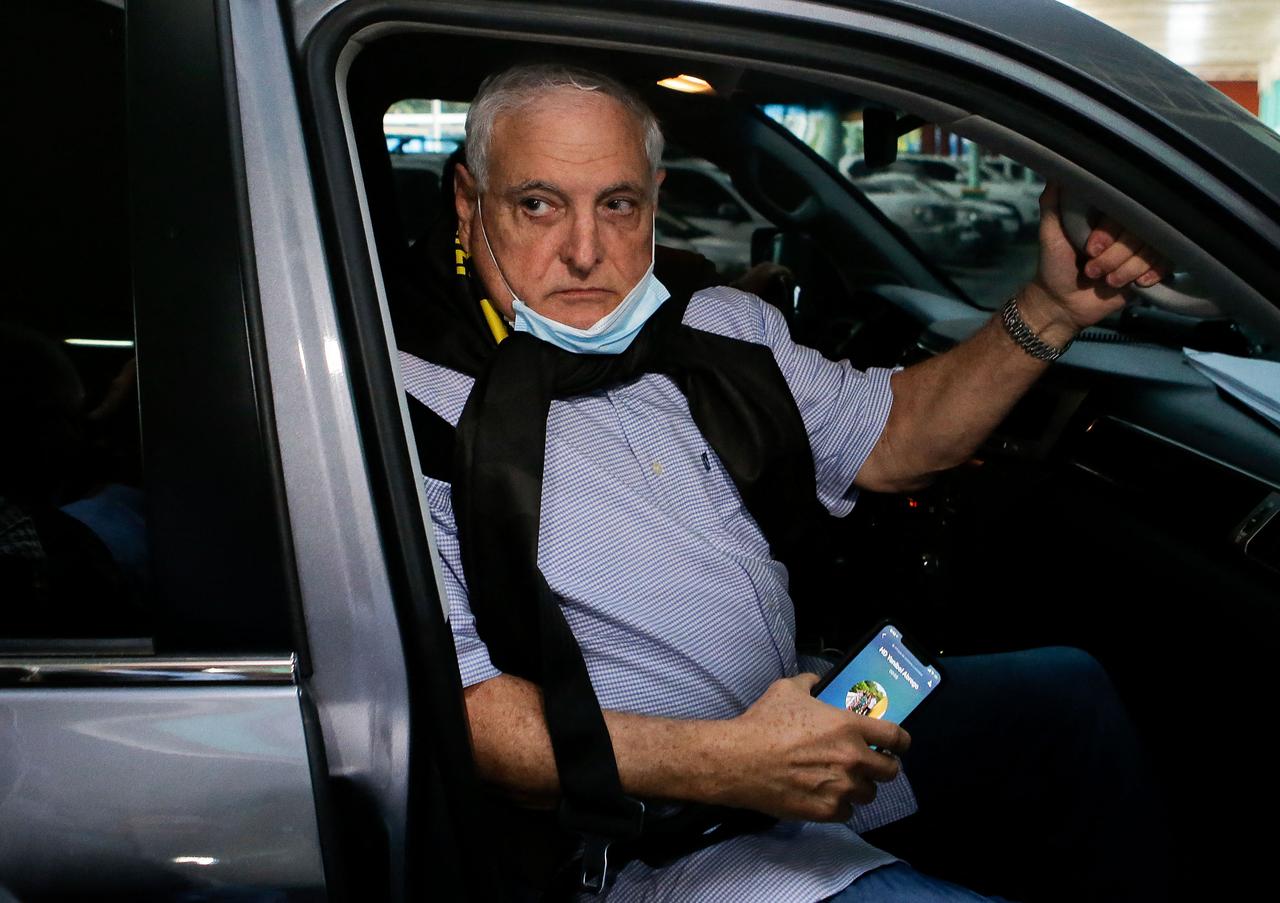 Panamanian former President Ricardo Martinelli arrives at the Accusatory Penal System headquarters in Panama City, on July 21, 2021.