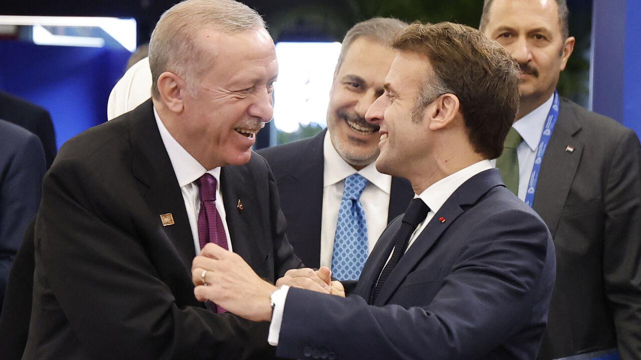 President Recep Tayyip Erdogan and his French counterpart Emmanuel Macron at NATO summit in Brussels on 14 June, 2021. (AA Photo)
