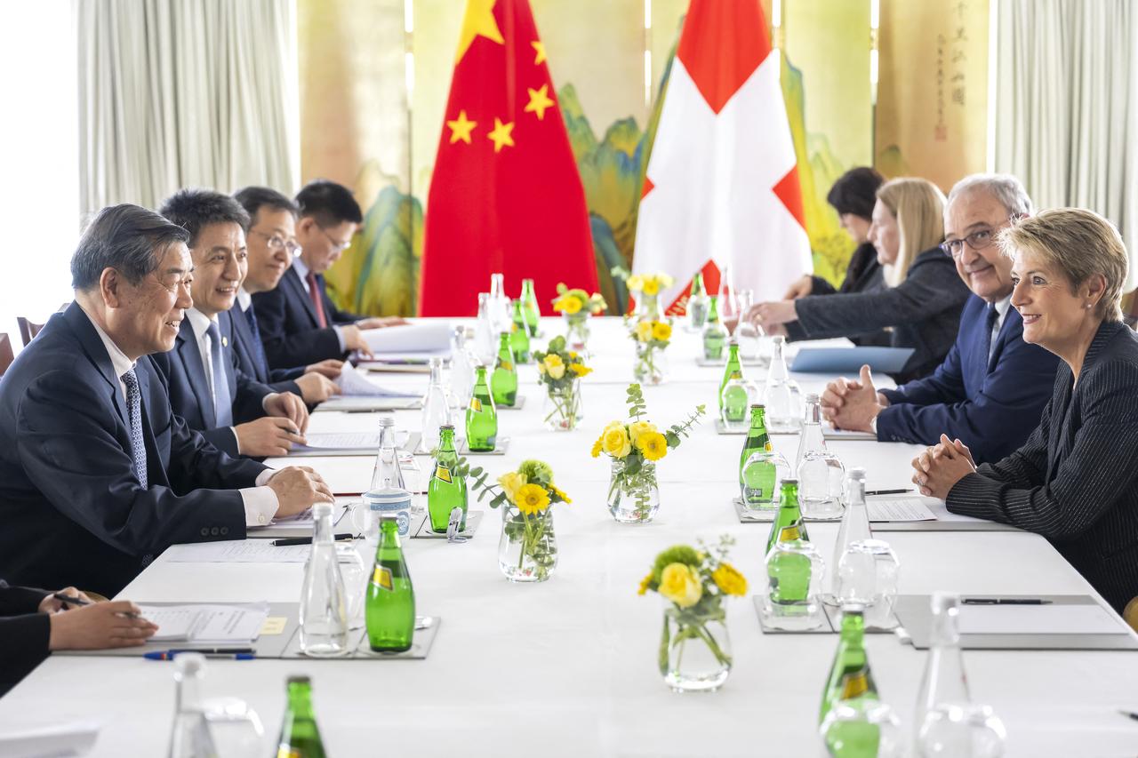 China's Vice Premier He Lifeng (L), Switzerland's Economy Minister Federal Councillor Guy Parmelin (2nd R) and Switzerland's President Karin Keller-Sutter (R) speak during a meeting to discuss trade relations and tariffs, in Geneva, on May 9, 2025. (AFP Photo)