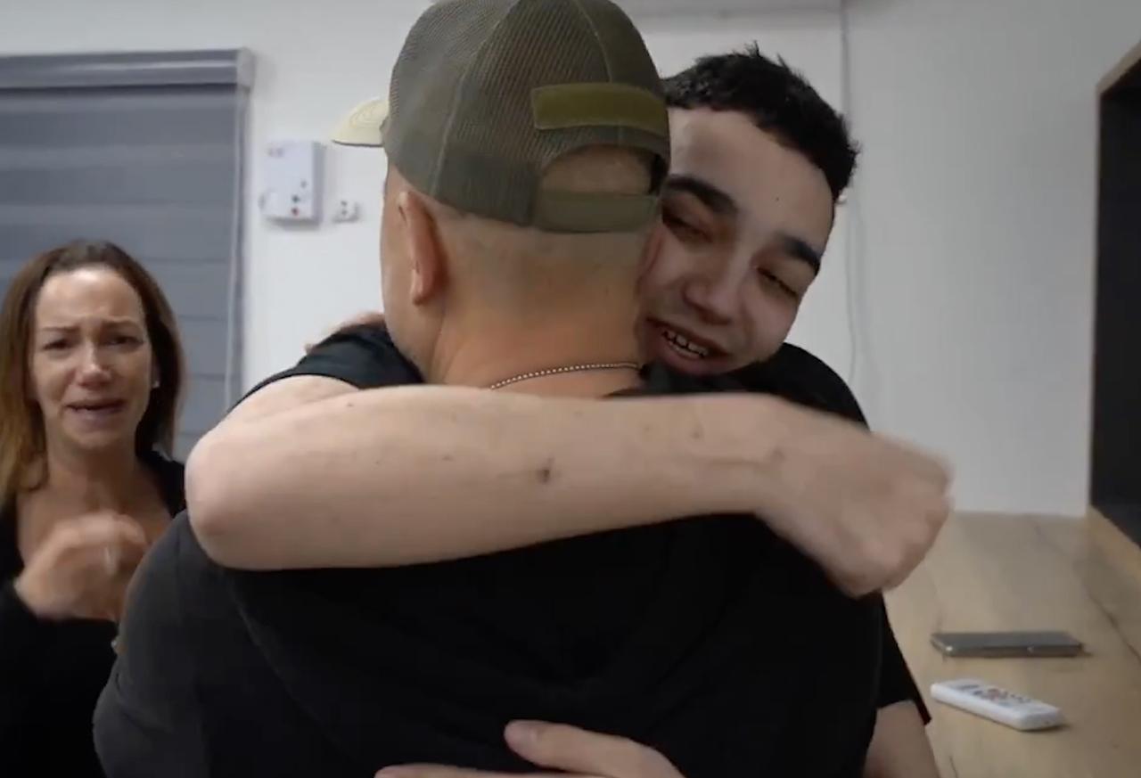 A screen grab from a video released by Israel Defense Forces (IDF) shows American-Israeli hostage Edan Alexander reuniting his family after Palestinian resistance group Hamas released him in Tel Aviv, Israel on May 12, 2025. (AA Photo)