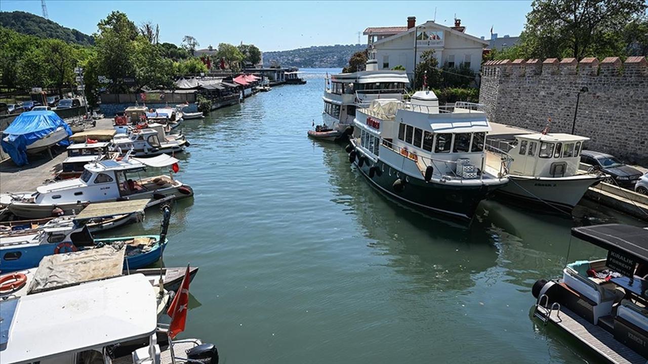A view of the Goksu Stream where it meets the Bosphorus, showcasing a variety of vessels moored along the historic banks near Anadoluhisarı, in Istanbul Türkiye. (AA Photo).