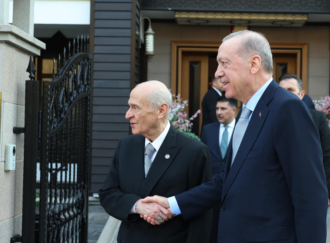 Turkish President Recep Tayyip Erdogan (R) leaves after visiting Nationalist Movement Party (MHP) Chairman Devlet Bahceli (L) at his residence in Ankara, Turkiye on May 06, 2025. (AA Photo)