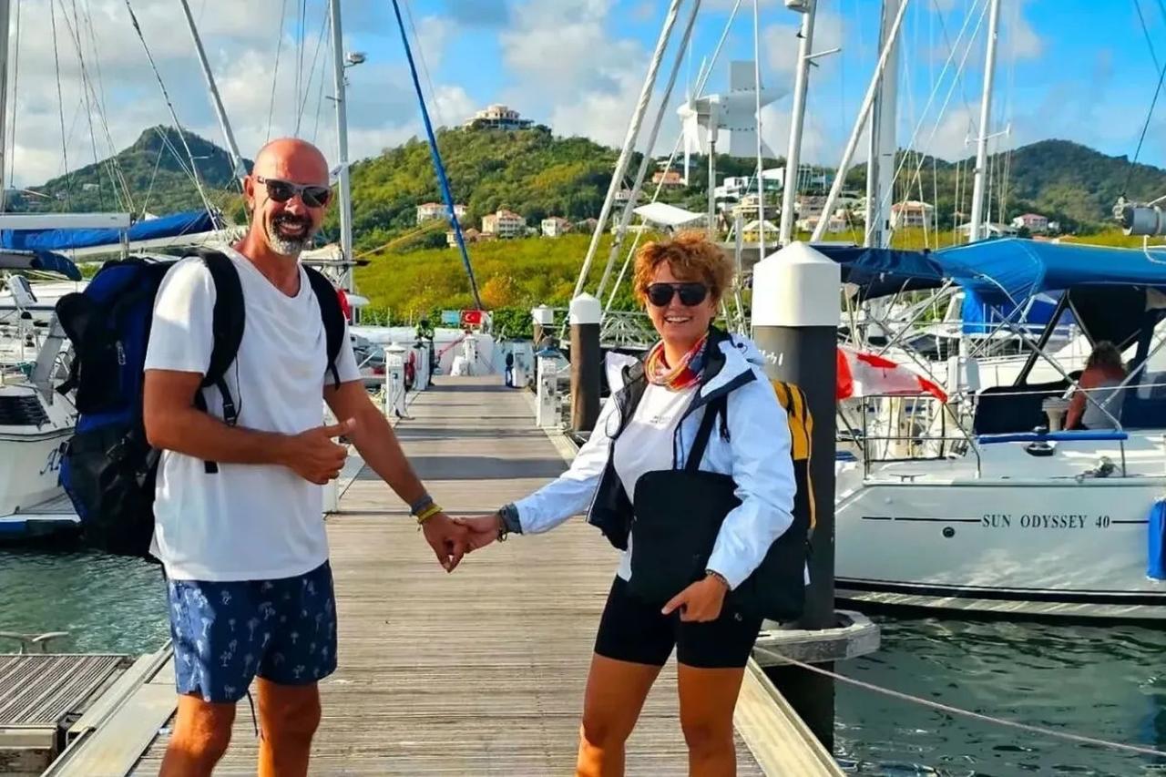 Experienced Turkish sailors Ozkan and Ozlem Sahin pose in a marina. (Photo via Patronlar Dunyasi)