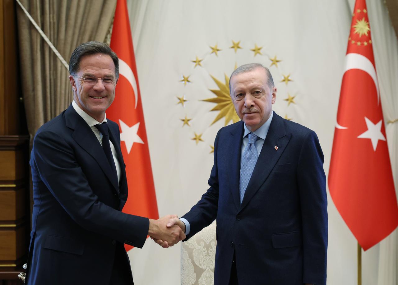 Turkish President Recep Tayyip Erdogan (R) shakes hands with NATO Secretary General Mark Rutte at the Presidential Complex in Ankara, Turkiye on May 13, 2025.. (Turkish Presidency - AA Photo)