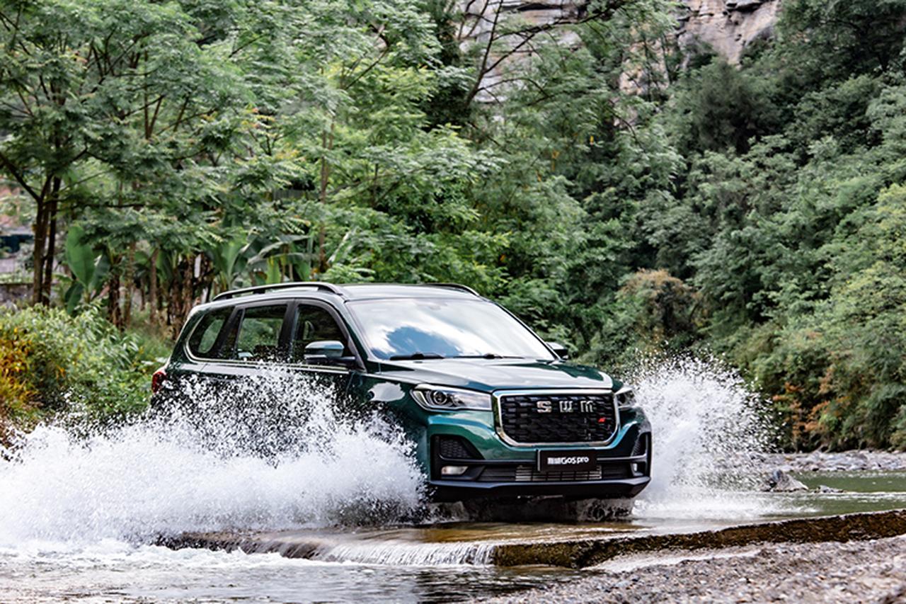 Promotional photo shows an SWM G05 Pro SUV navigating through a shallow stream in a forested area, accessed on May 14, 2025. (AA Photo)
