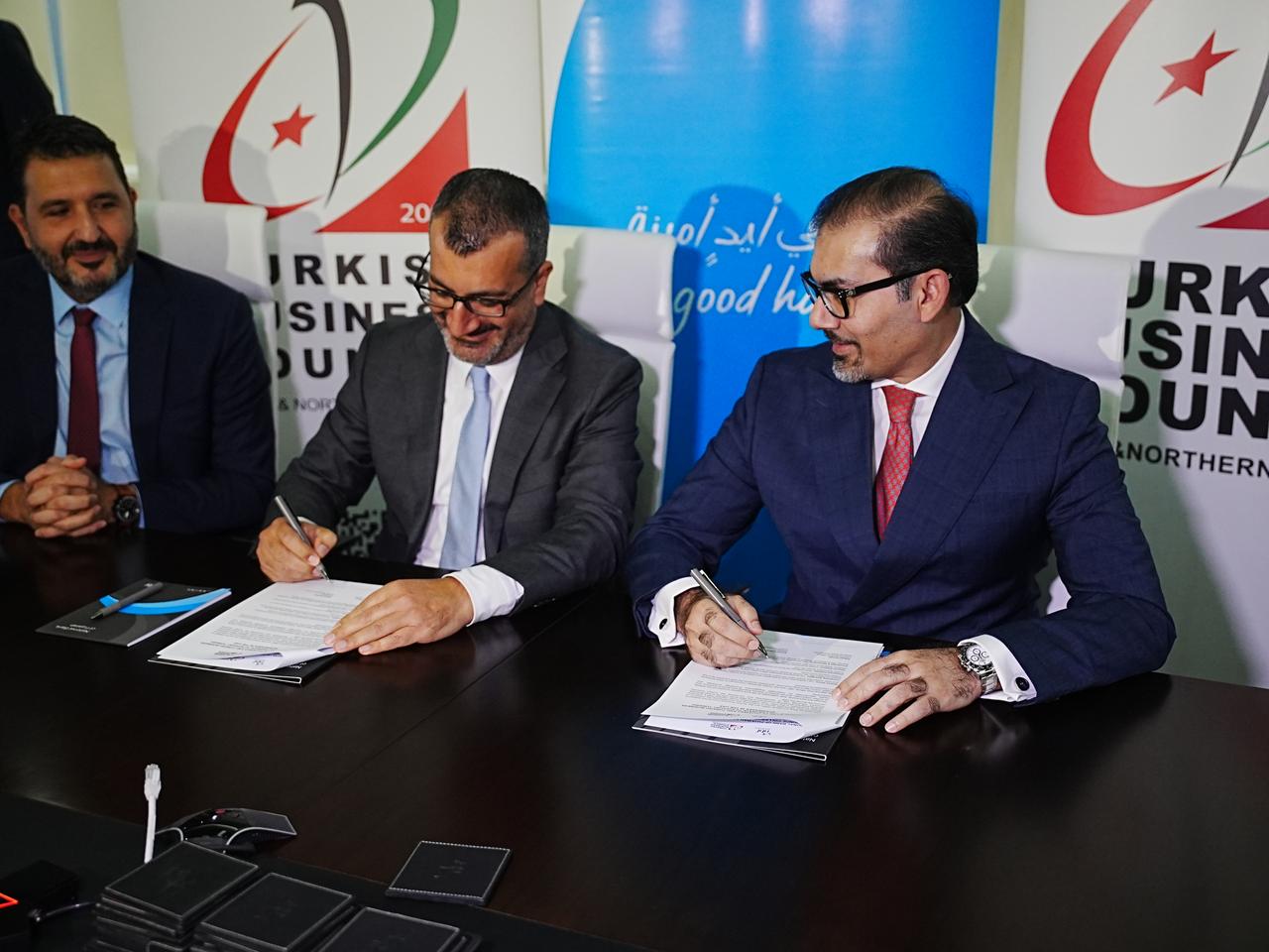 CEO of the National Bank of Fujairah Adnan Anwar (right) and President of the Turkish Business Council of Dubai and the Northern Emirates Kanat Kutluk (left) attend the signing of a strategic agreement in Dubai on May 13, 2025. (AA Photo)