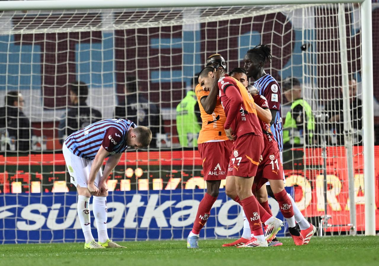 Players of Galatasaray celebrate after scoring a goal during the Turkish Super Lig week 35 football match between Trabzonspor and Galatasaray at Papara Park in Trabzon, Turkiye on May 10, 2025. (AA Photo)