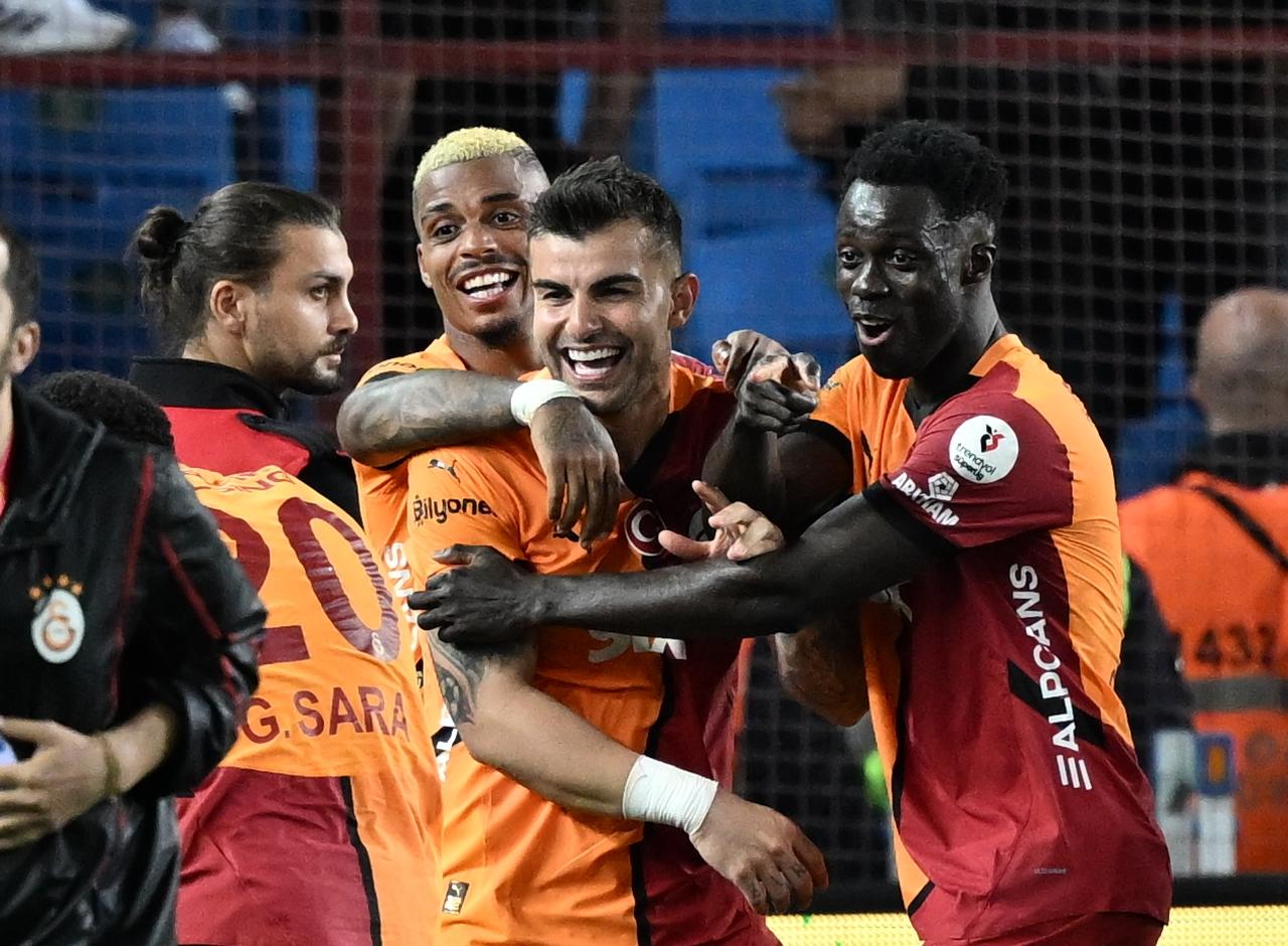 The emblems of Trabzonspor and Galatasaray stand prominently against the backdrop of Gaziantep Stadium. (Türkiye Today)