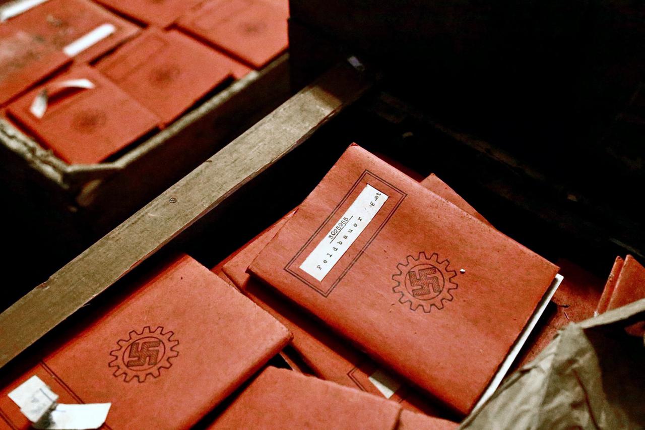 Documents recovered from wooden crates in the basement of Argentina's Supreme Court included Nazi notebooks, photographs, and postcards. (AFP Photo)