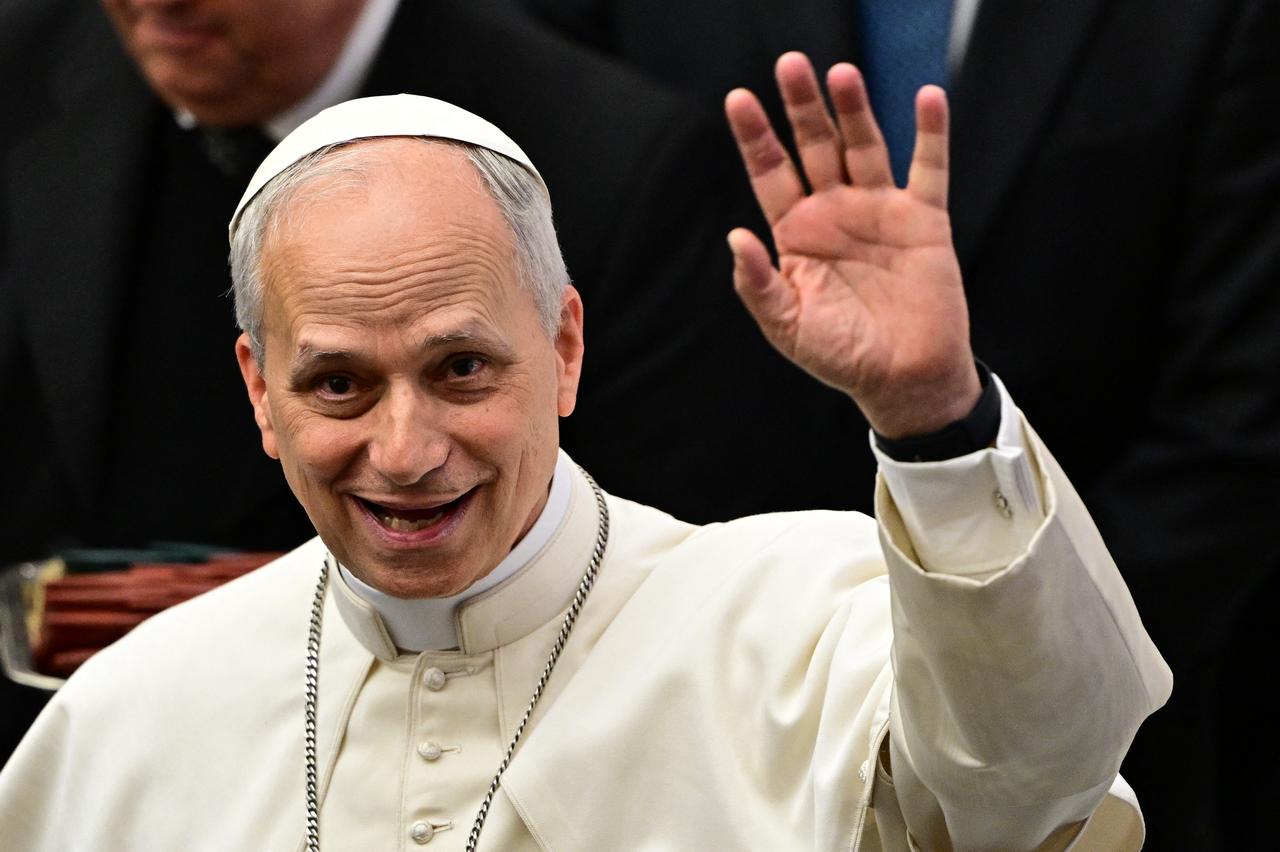 Pope Leo XIV gesture during an audience to representatives of the media, at Paul-VI hall in The Vatican, on May 12, 2025. (Photo by Tiziana FABI / AFP)