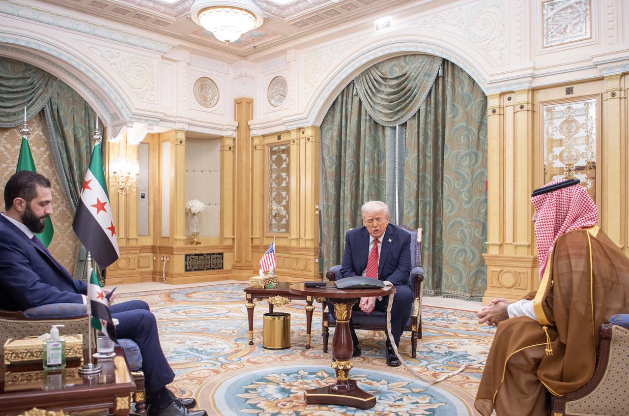 US President Donald Trump (C) meets with Syrian President Ahmed al-Shara (L) along with the Saudi Crown Prince Mohammed bin Salman Al Saud (R) during the first leg of his three-country Middle East tour in Riyadh, Saudi Arabia on May 14, 2025. (Bandar Al-Jaloud/Saudi Royal Court - Anadolu Agency)