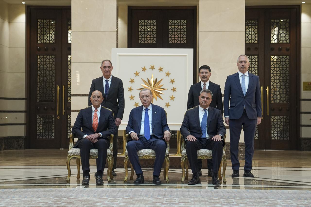 ANKARA, TURKIYE - MAY 14: Turkish President Recep Tayyip Erdogan (C) poses for a photo with U.S. Ambassador Thomas Joseph Barrack, Jr. after receiving his letter of credence at the Presidential Complex in Ankara, Turkiye on May 14, 2025. ( Muhammed Selim Korkutata - Anadolu Agency )
