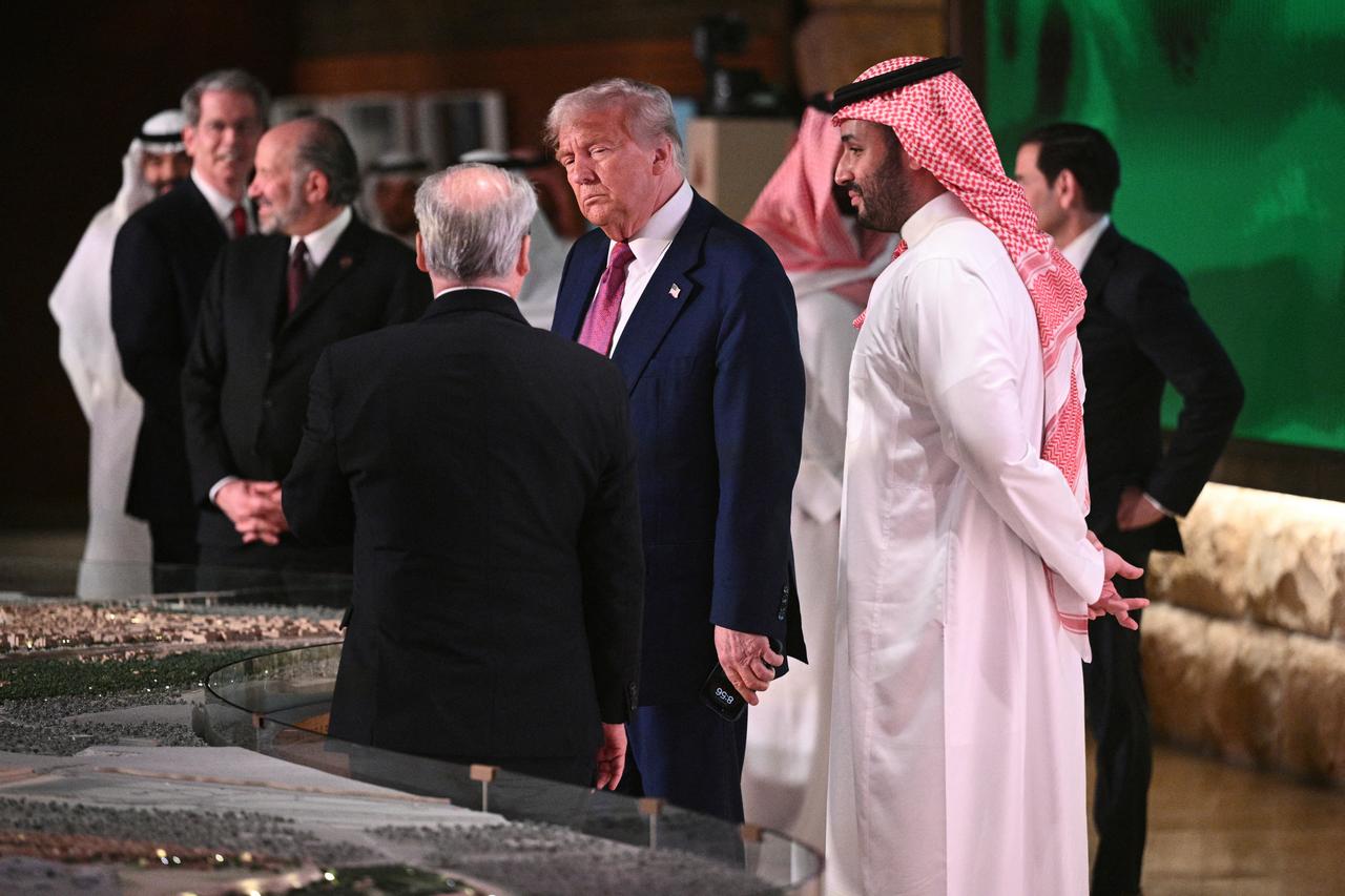 U.S. President Donald Trump and Saudi Crown Prince Mohammed bin Salman walk in the old district of Diriyah on the outskirts of the Saudi capital Riyadh, before a state dinner on May 13, 2025. (AFP Photo)