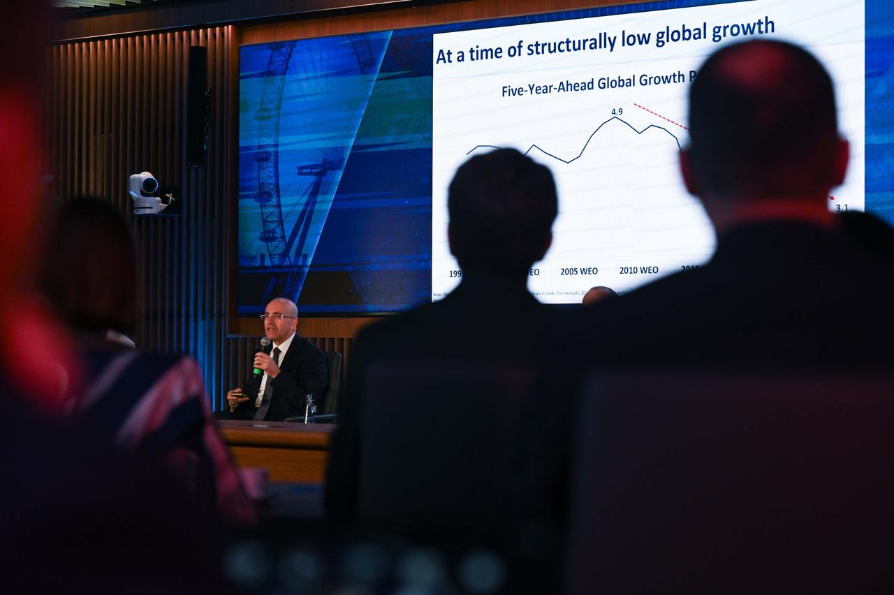 Turkish Treasury and Finance Minister Mehmet Simsek delivers a presentation on the Turkish economy and answers questions during the session titled "Turkiye’s Economic Transformation and Growing Investment Potential" held as part of the European Bank for Reconstruction and Development (EBRD) Annual Meetings in London, United Kingdom, on May 14, 2025. (AA Photo)