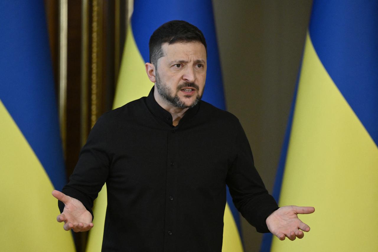 Ukraines President Volodymyr Zelensky holds a press conference in Kyiv on May 13, 2025, amid the Russian invasion of Ukraine. Zelensky urged the United States to levy its most hard-hitting package of sanctions on Moscow if Russian President rejects a call to meet in Turkey this week. (Photo by Genya SAVILOV / AFP)