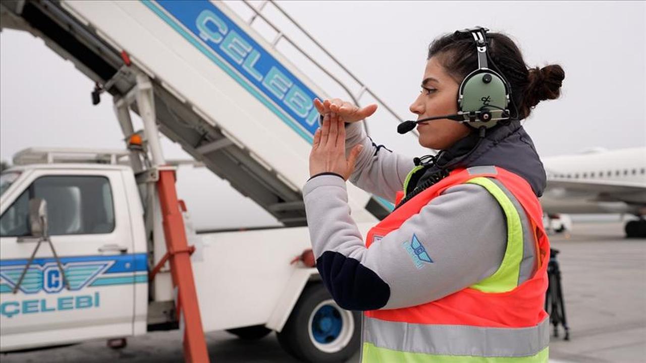 Photo shows Celebi Aviation ground services vehicle alongside company worker on an airport apron, accessed on May 15, 2025. (AA Photo)