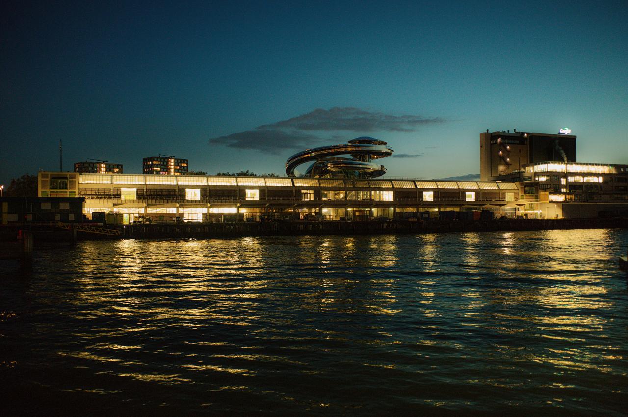 The Fenix museum and its Tornado viewing platform are seen illuminated from the Maas River in Rotterdam, Netherlands, accessed May 14, 2025. (Courtesy of Fenix Museum)