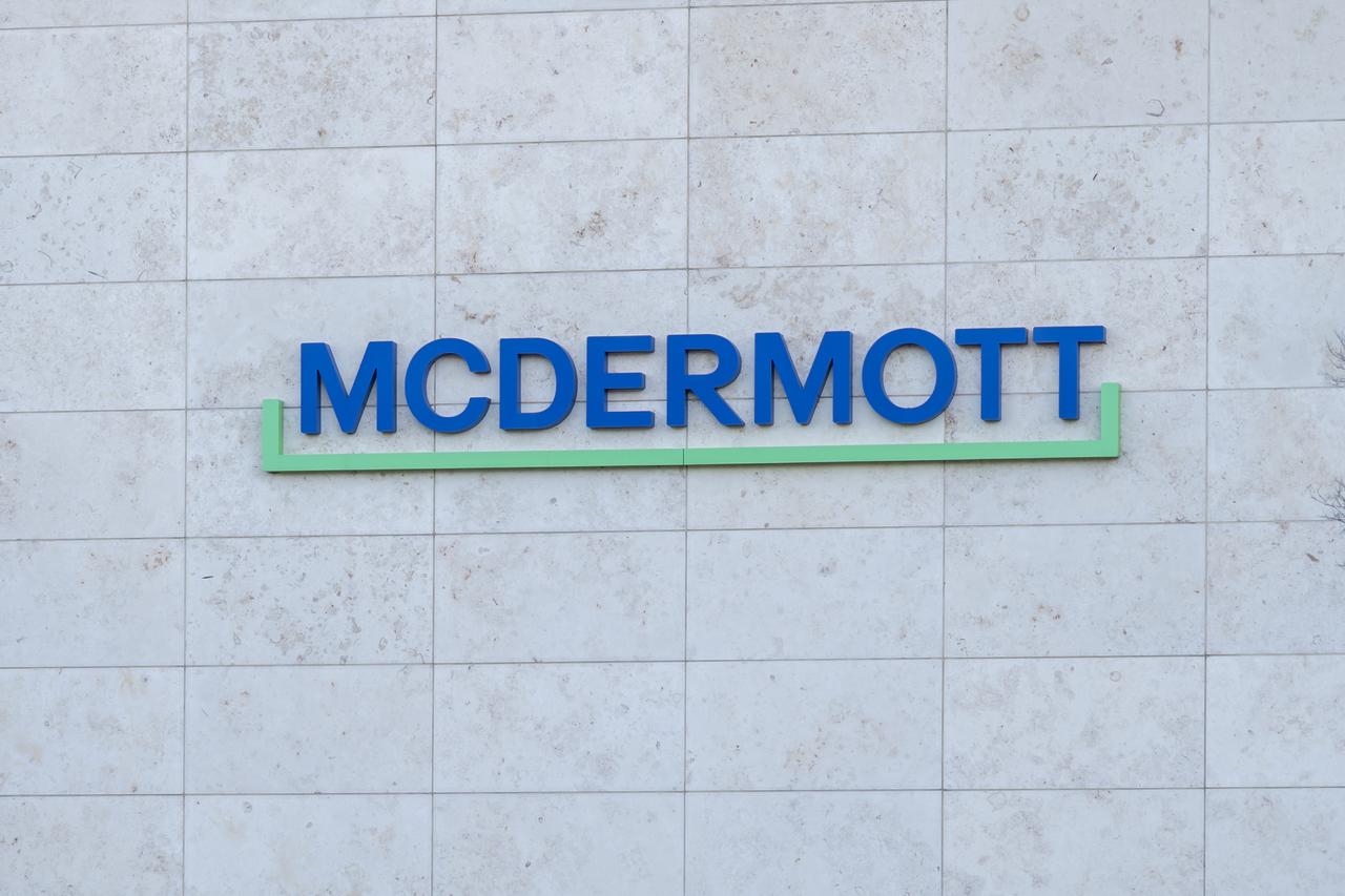 Close-up view of the McDermott company logo on the exterior wall of its facility in Houston, Texas, US, on March 2, 2022. (Adobe Stock Photo)