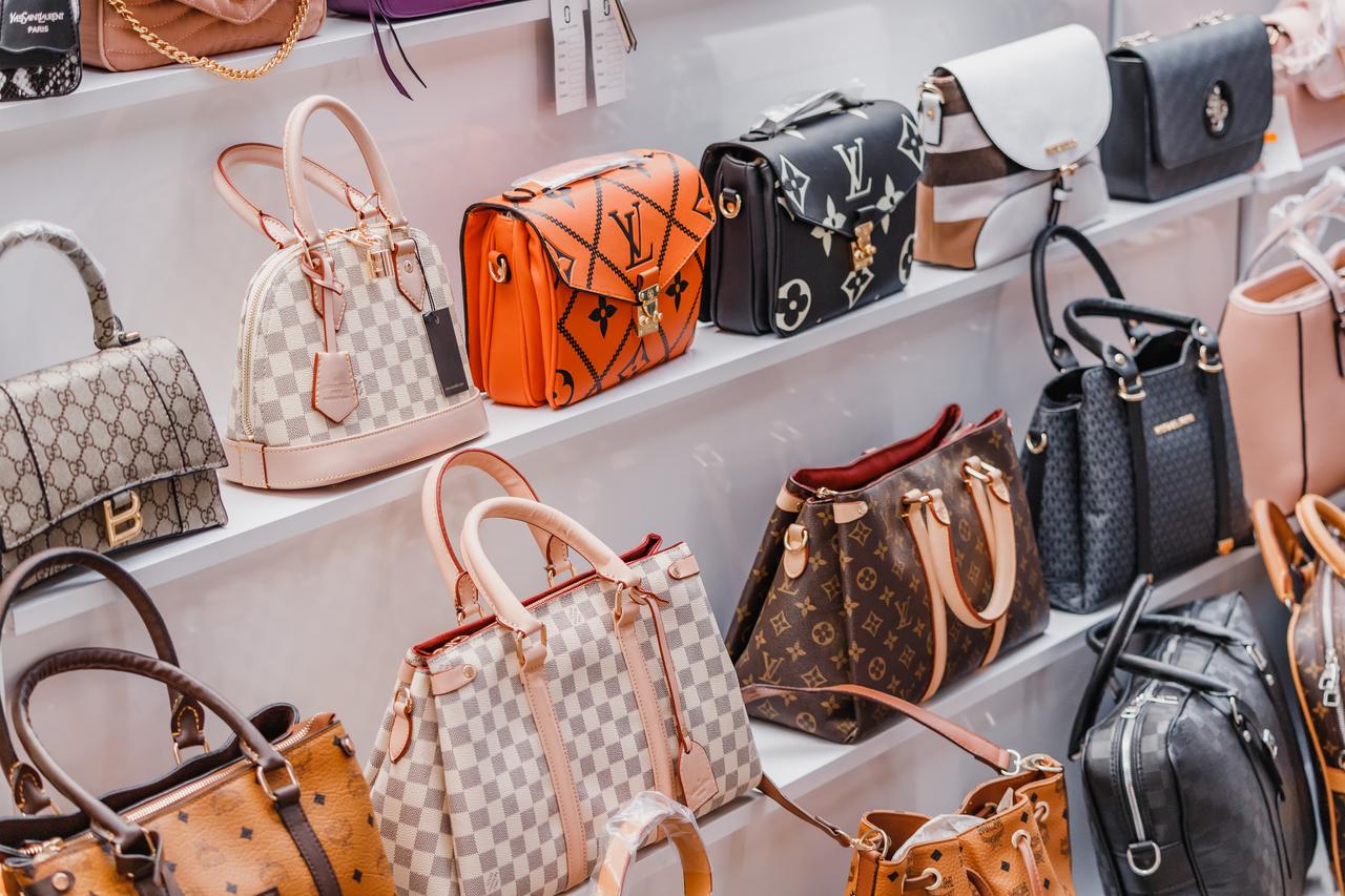 Counterfeit luxury handbags displayed at a street market in Antalya, Türkiye, on July 7, 2022. (Adobe Stock Photo)
