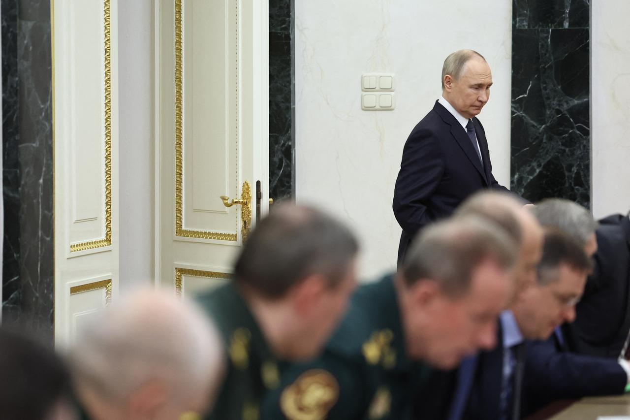 In this pool photograph distributed by the Russian state agency Sputnik, Russia's President Vladimir Putin holds a meeting on the upcoming direct peace talks with Ukraine, set to be held in Istanbul, in Moscow on May 14, 2025. (AFP Photo)