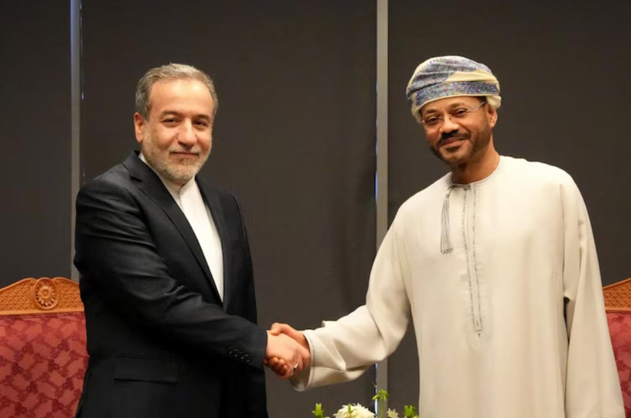 This handout picture provided by the Iranian Ministry of Foreign Affairs shows Irans Foreign Minister Abbas Araghchi (L) meeting with Omans Foreign Minister Sayyid Badr al-Busaidi in Muscat on April 12, 2025. (AFP Photo)