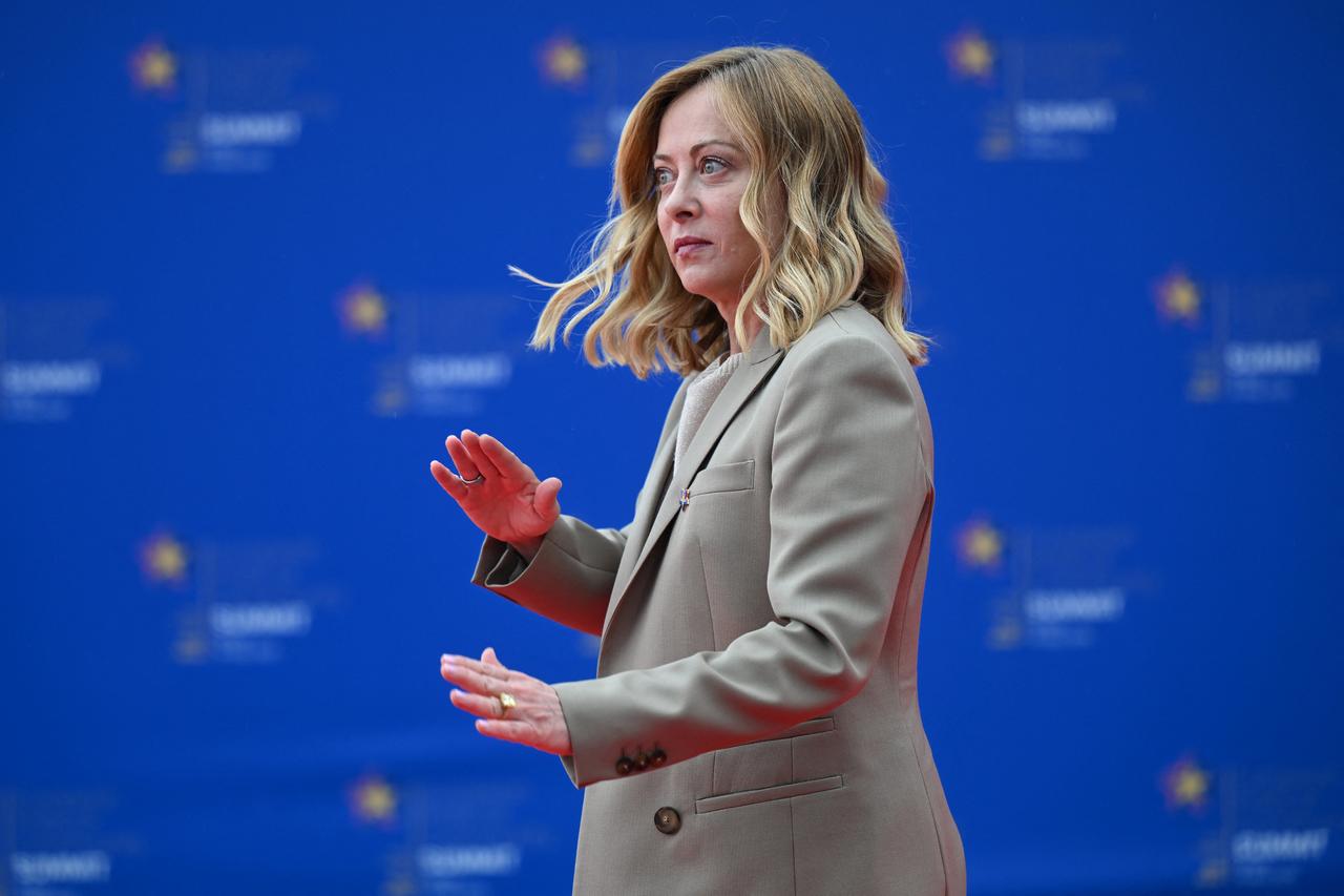 Italys Prime Minister Giorgia Meloni arrives for the European Political Community (EPC) summit, in Tirana on May 16, 2025. (Photo by Armend NIMANI / AFP)