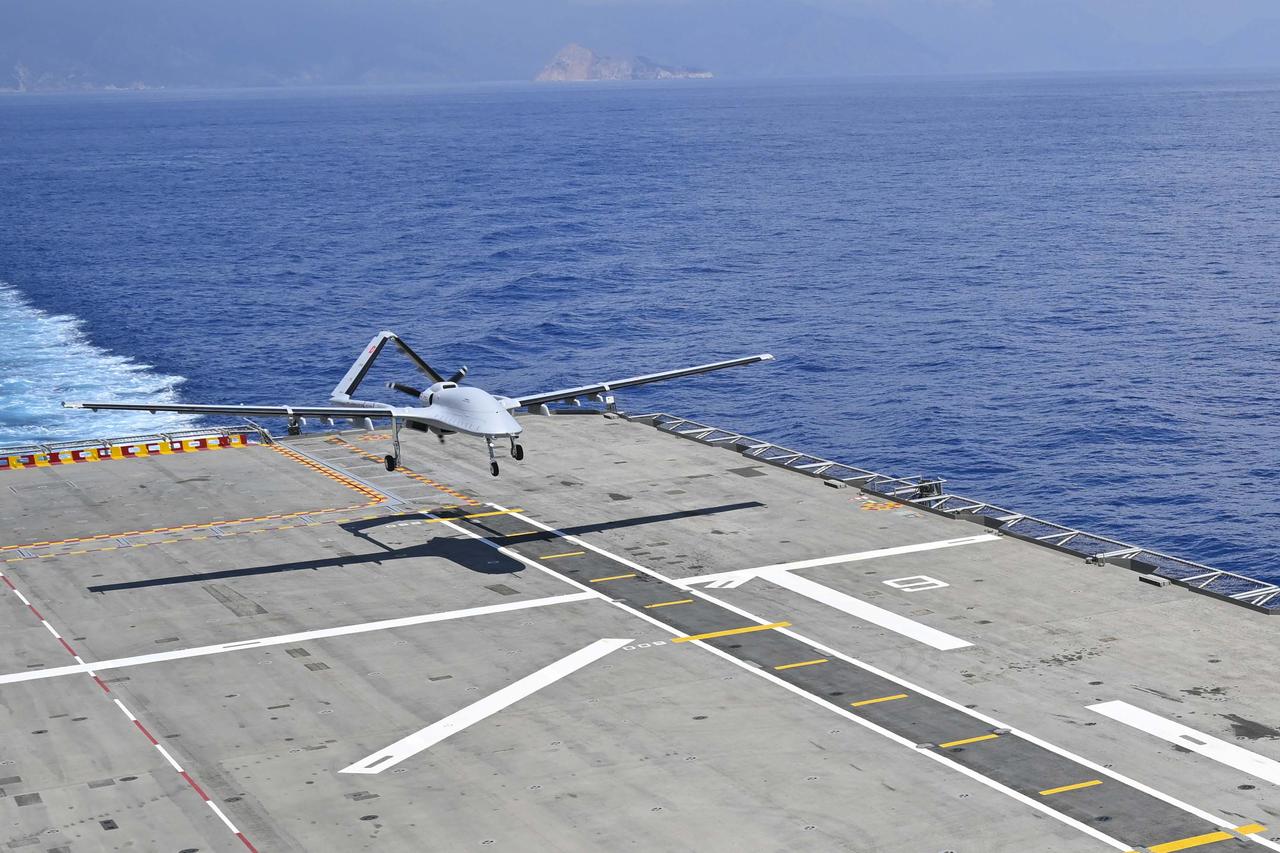 Bayraktar TB3, the first armed unmanned aerial vehicle (UAV) to take off and land from a short-runway ship, performs as part of the Distinguished Observer Day activities of the DENIZKURDU-II/2025 naval exercise conducted by the Turkish Naval Forces Command in the Eastern Mediterranean on May 14, 2025. (AA Photo)