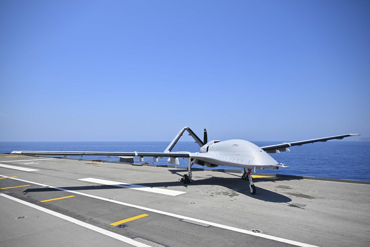 ANTALYA, TURKIYE - MAY 14: Bayraktar TB3, the first armed unmanned aerial vehicle (UAV) to take off and land from a short-runway ship, performs as part of the Distinguished Observer Day activities of the DENIZKURDU-II/2025 naval exercise conducted by the Turkish Naval Forces Command in the Eastern Mediterranean on May 14, 2025. The large-scale exercise spans the Black Sea, Marmara, Aegean, and Eastern Mediterranean, involving 120 vessels, 85 air assets, elite underwater teams, and multiple units from the Turkish Armed Forces and other government agencies. ( ?smail Kaplan - Anadolu Agency )